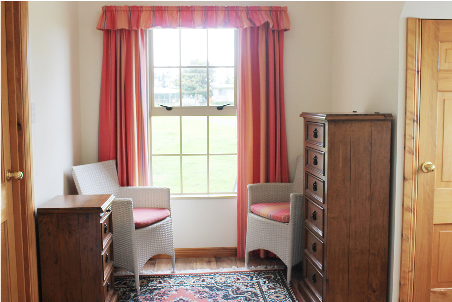 seating area in the king bedroom the carriage house kerikeri